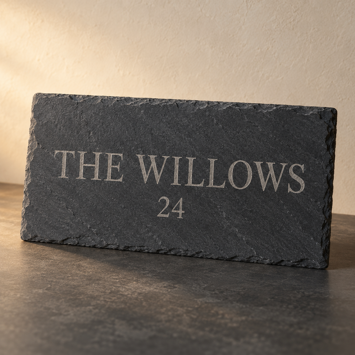 AI-generated illustrative design example of bespoke engraved slate sign; actual grain, size and engraving are agreed for the order